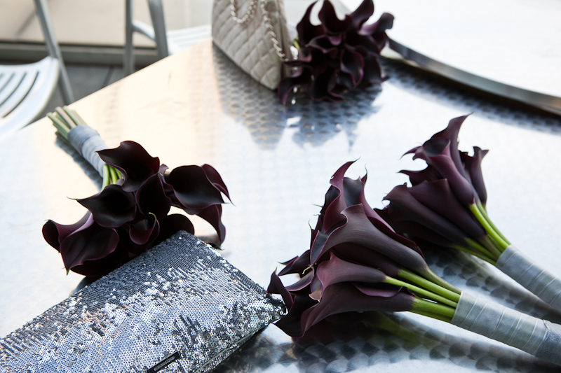 Purple calla lilies decorate the tables during this fall wedding reception at the Kimmel Center.