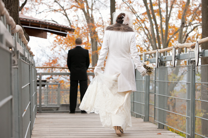 Bride and groom have their first look outside before their modern, winter wedding at Morris Arboretum in Philadelphia.