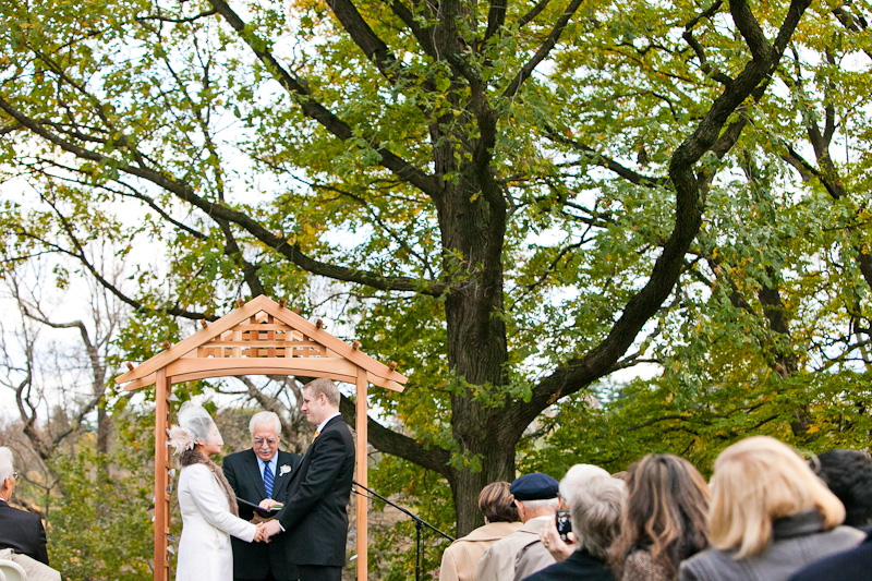 Outdoor fall wedding ceremony at Morris Arboretum, a unique botanical garden outside of Philadelphia.