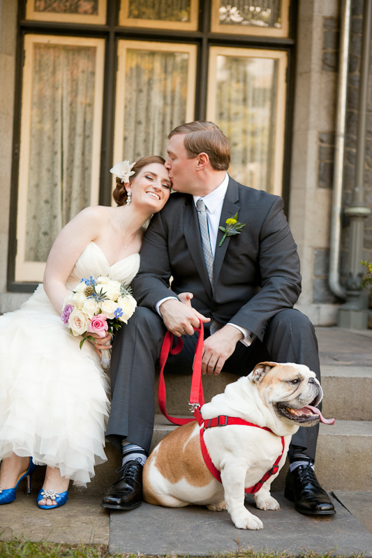 Bride and groom with their bulldog at their rustic, garden wedding ceremony in Delaware.