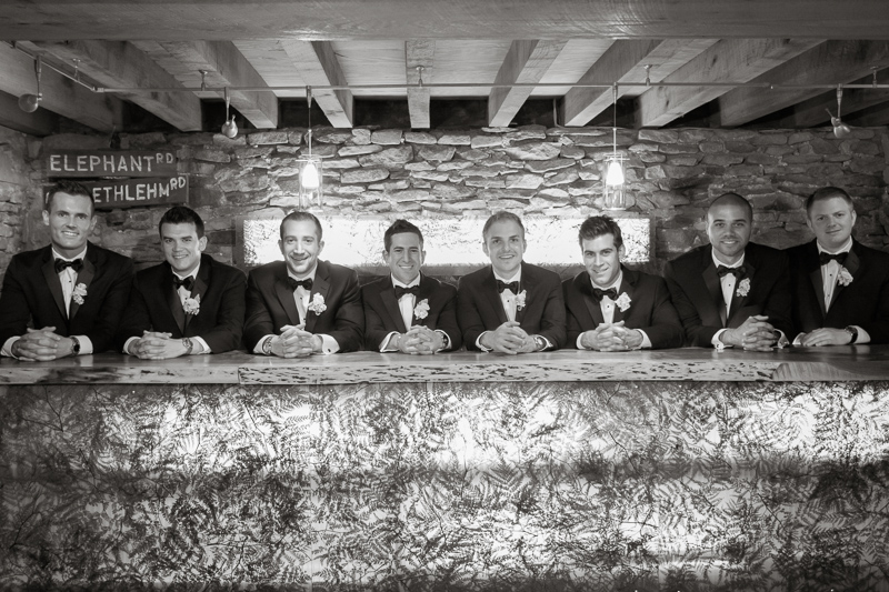 Groom with his groomsmen before the outdoor wedding ceremony at the Lake House Inn, outside of Philly.