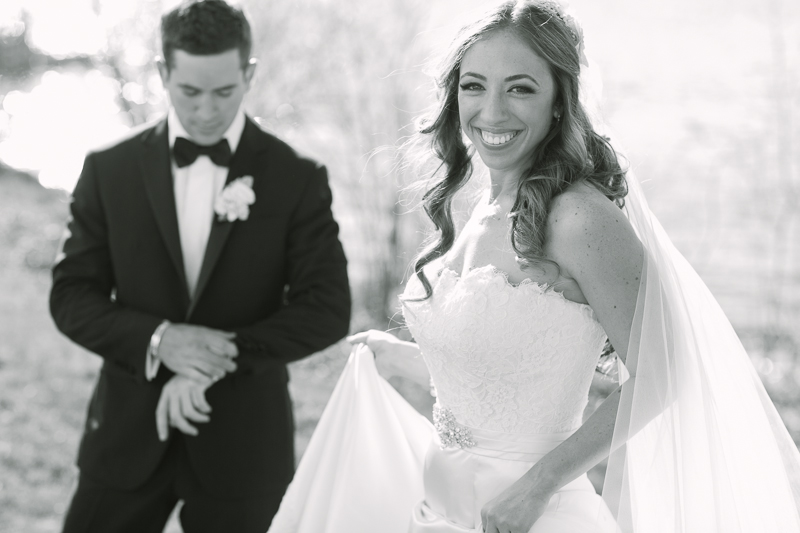 Portraits of the bride and groom at the Lake House Inn, a modern lakeside wedding venue.