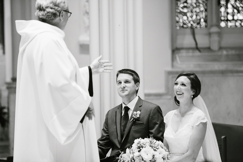 Bride and groom during their wedding ceremony inside Villanova Chapel on the Main Line.