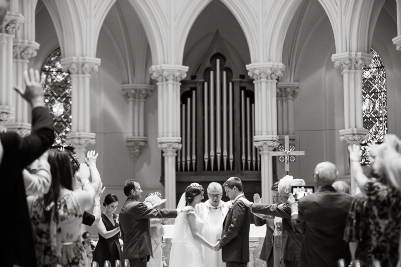 Bride and groom during their wedding ceremony at Villanova Chapel.