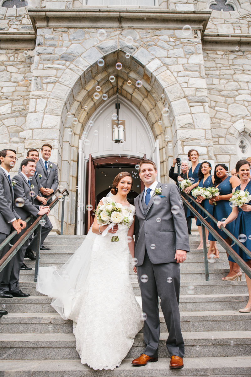 After an elegant wedding ceremony at Villanova Chapel, this bride and groom have a bubble send off.