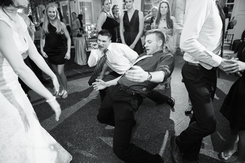 Fun candid moments during a wedding reception at Appleford Estate on the Main Line in Pennsylvania.