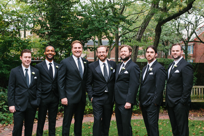 Outdoor portraits of the groom and groomsmen before the wedding ceremony at the Overbrook Golf Club, on the Main Line.
