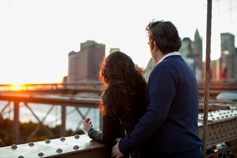 A gorgeous sunset during this romantic urban engagement shoot on the Brooklyn Bridge in Dumbo, NYC.