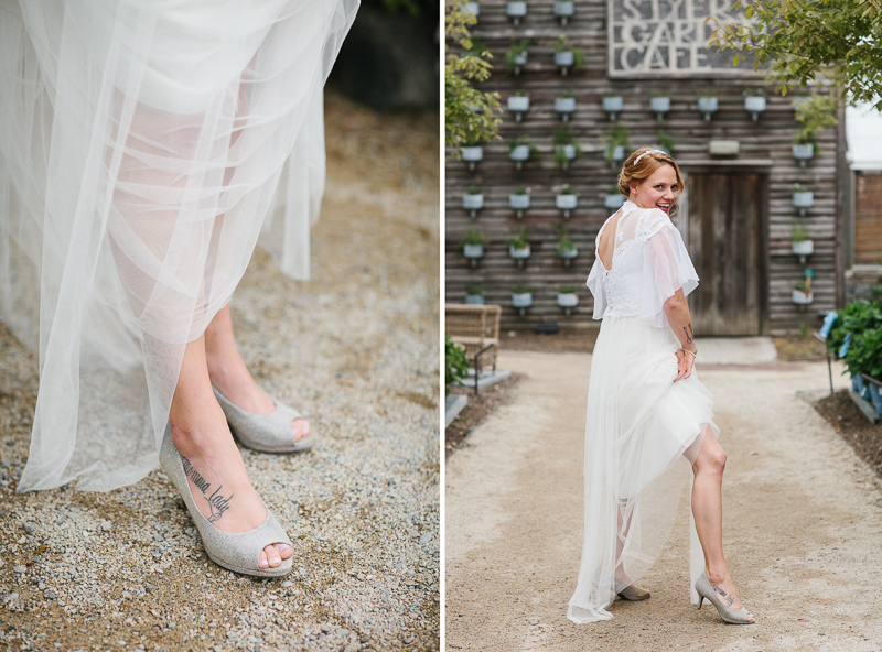 A spunky bride showing off the details of her dress at this Pennsylvania wedding.