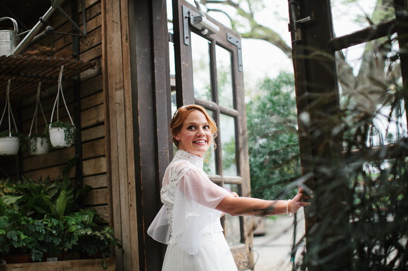 Vintage Anthropologie bride is excited to tie the knot at her outdoor wedding ceremony at Terrain.