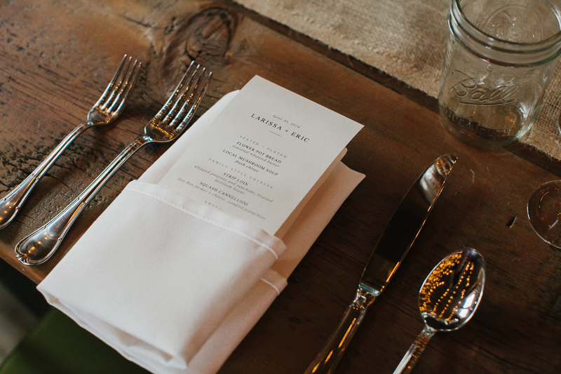 Beautiful rustic detail of the menu of food during this wedding dinner reception at Terrain.