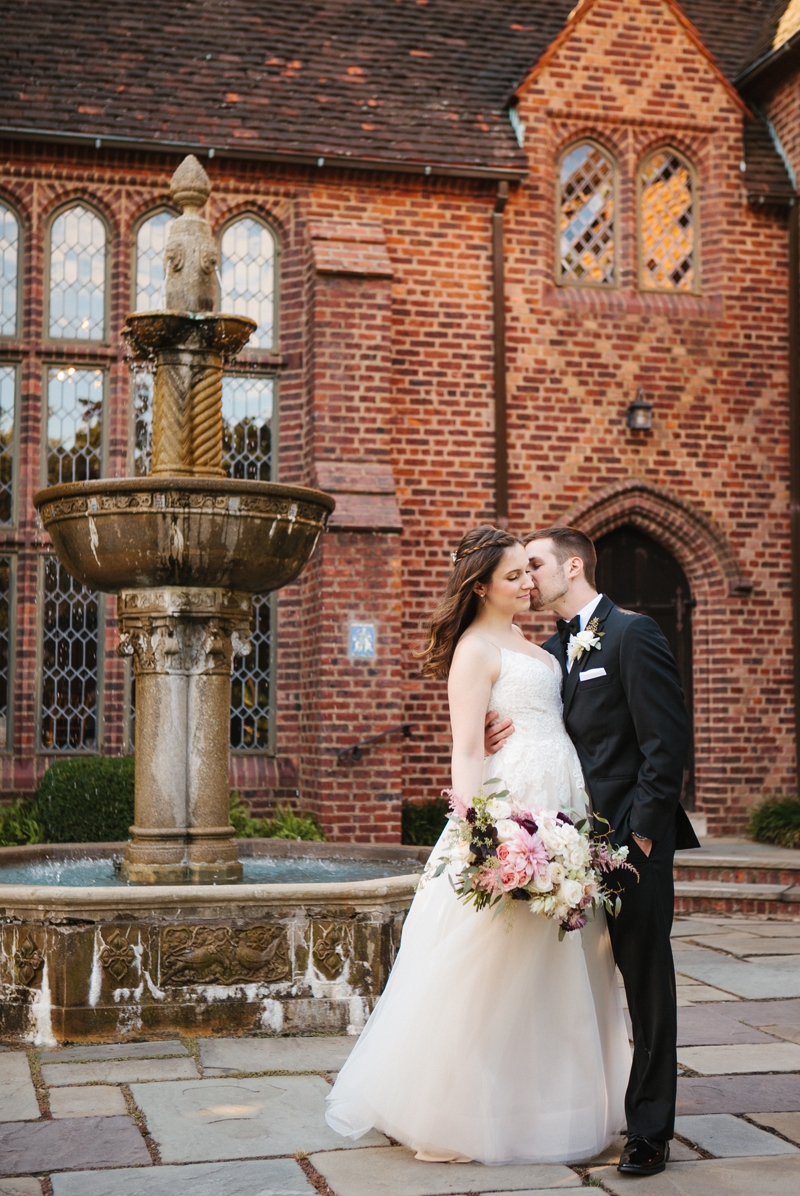 Portrait of the bride and groom outside of the historic Aldie Mansion in Bucks County.