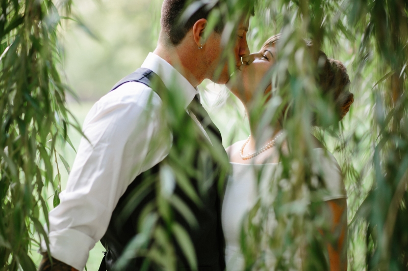 Romantic bridal portraits under a willow tree in Independence Park, Philadelphia.