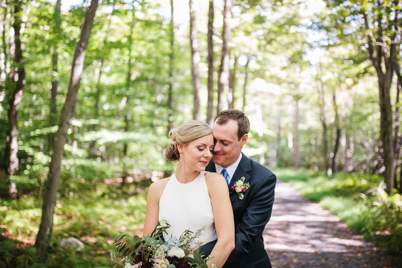 A portrait of the bride and groom in the woods of the beautiful Poconos, Pennsylvania.
