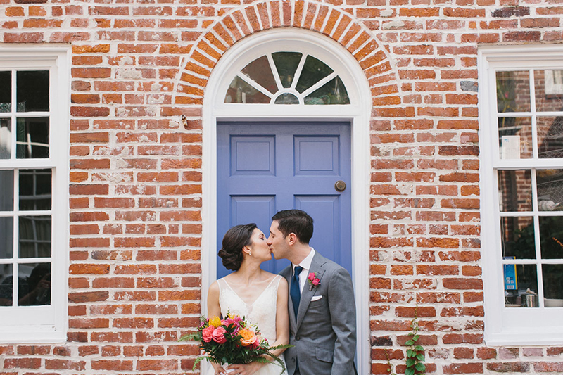 A portrait of the bride and groom on the classic cobblestone streets of Philadelphia.