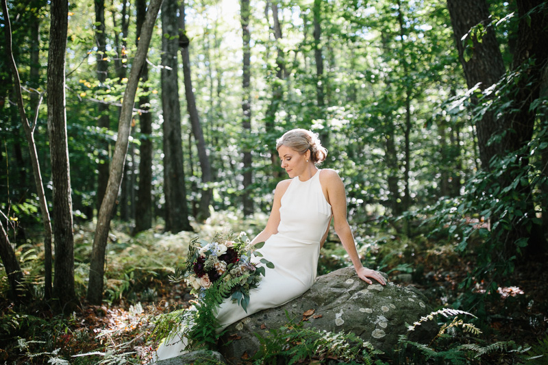 Portrait of the bride before her wedding ceremony at by Lake Naomi in Poconos, PA.
