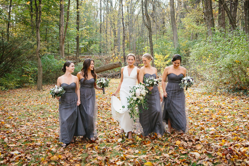 fun wedding party photos in fall leaves and woods Bucks County