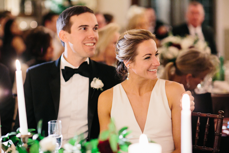 candid wedding photo of bride and groom at holly hedge estate reception