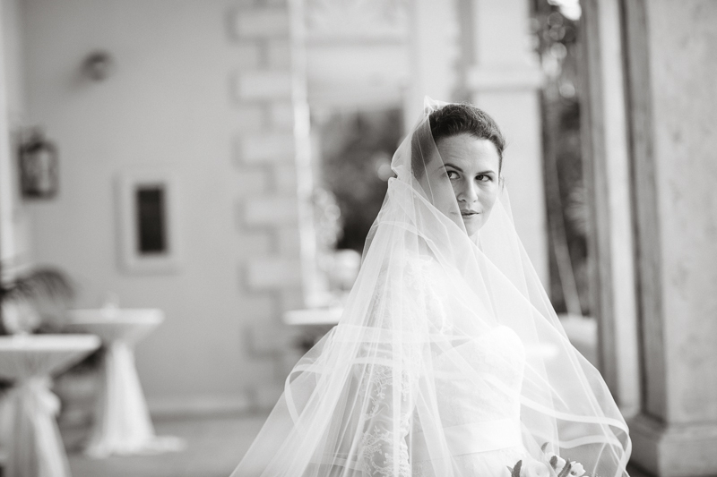 Gorgeous outdoor portraits of the bride before her wedding reception outside of Waikiki, Hawaii.