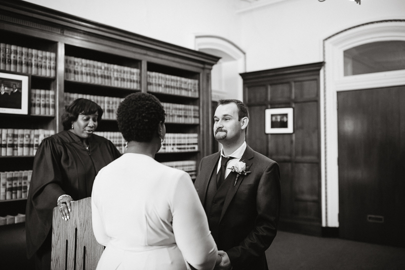 Couple exchanges vows during their intimate elopement wedding in Philadelphia.