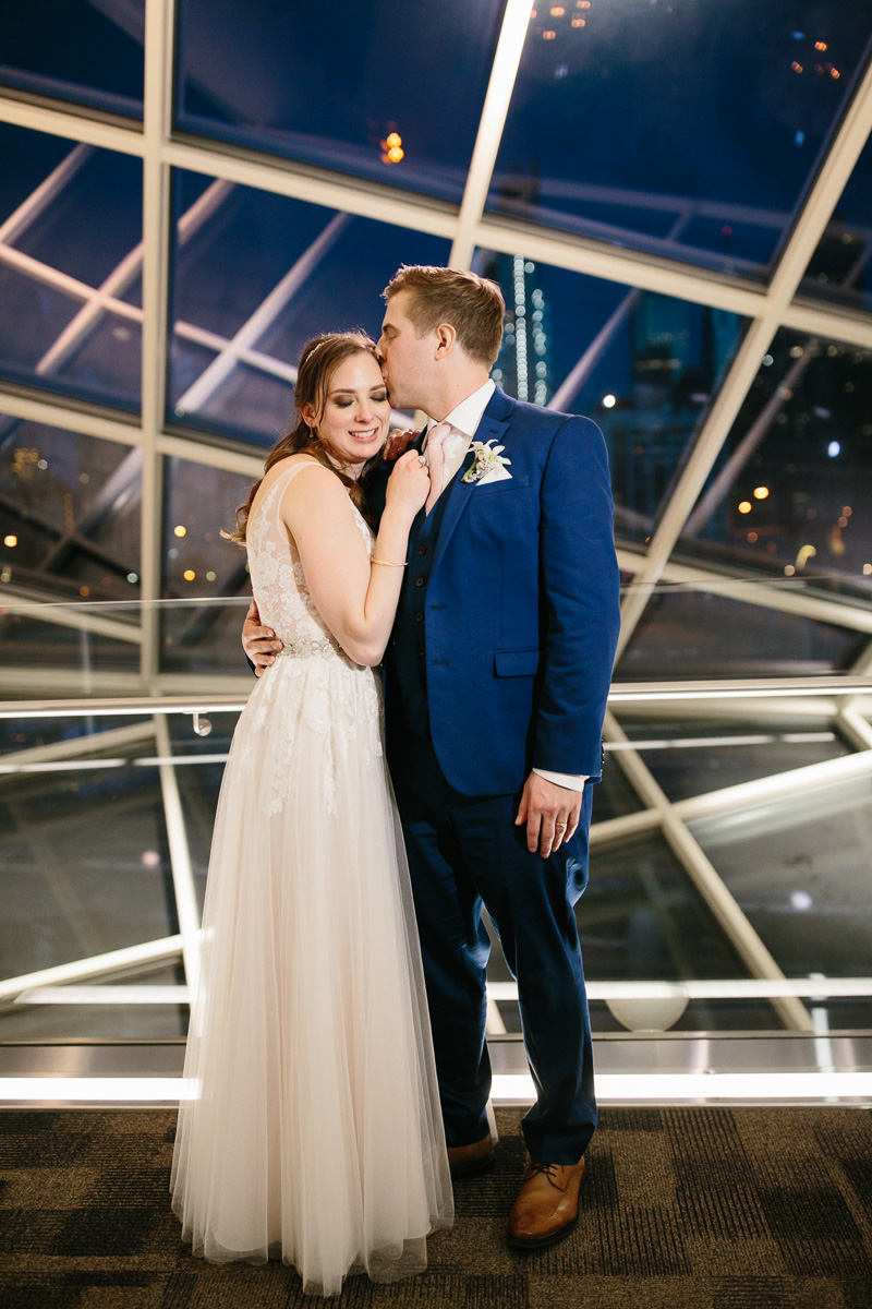 Unique portraits of the bride and groom at night in Philadelphia.