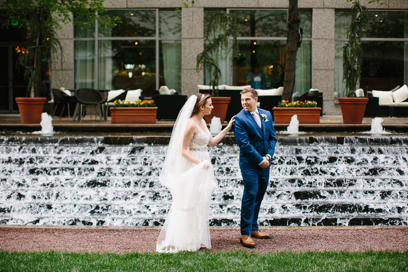 Bride and groom have their first look outside of the Cira Centre in Philadelphia.