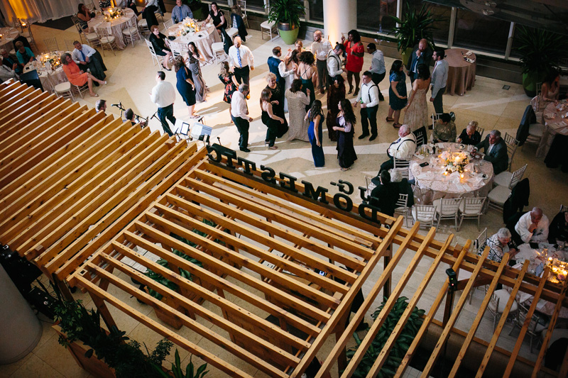Wedding guests enjoy this wedding reception at the Cira Centre in Philadelphia.
