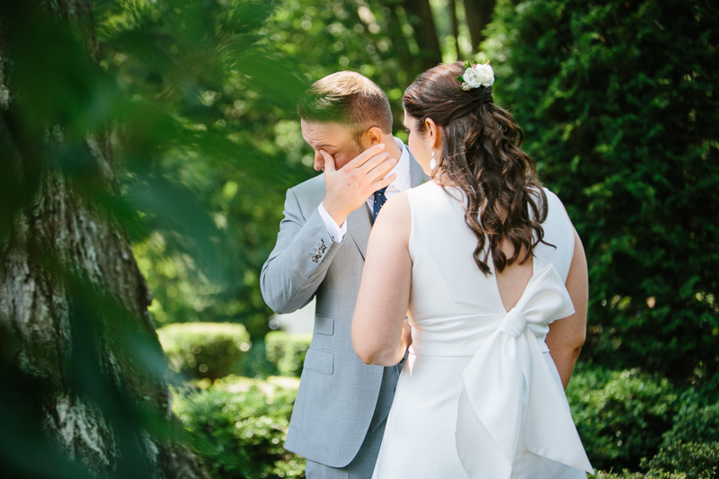 Groom tears up during first look at Appleford Estate.