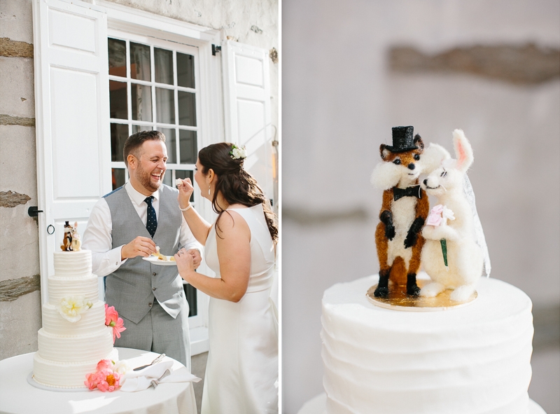 Bride and groom cut the cake during their modern wedding reception.