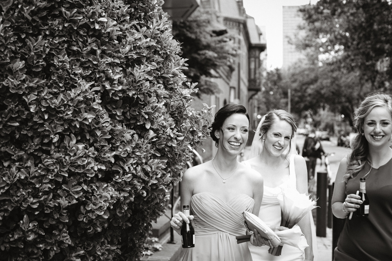 Bride enjoys the walk to her spring wedding ceremony at 23rd Street Armory.