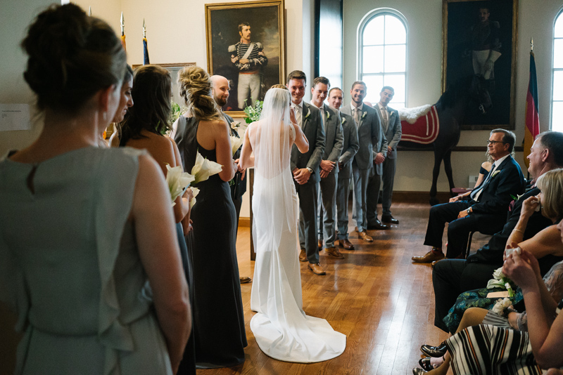 Bride and groom share their vows at their 23rd Street Armory wedding ceremony in Philadelphia.