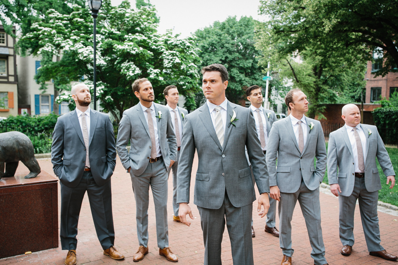 Groom with his groomsmen in Filter Square during spring.