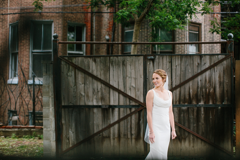 Bride takes portraits before her wedding at the 23rd Street Armory.