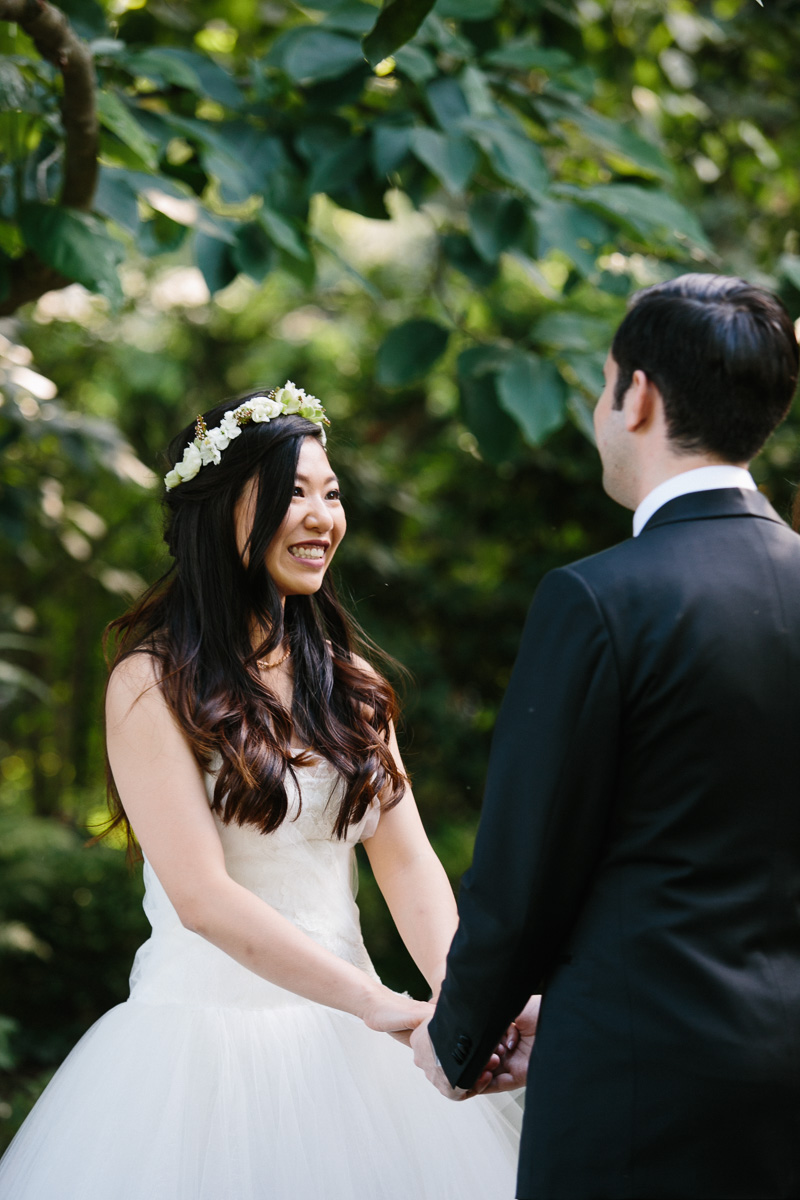 Bride and groom have their first look outdoors before their ceremony.