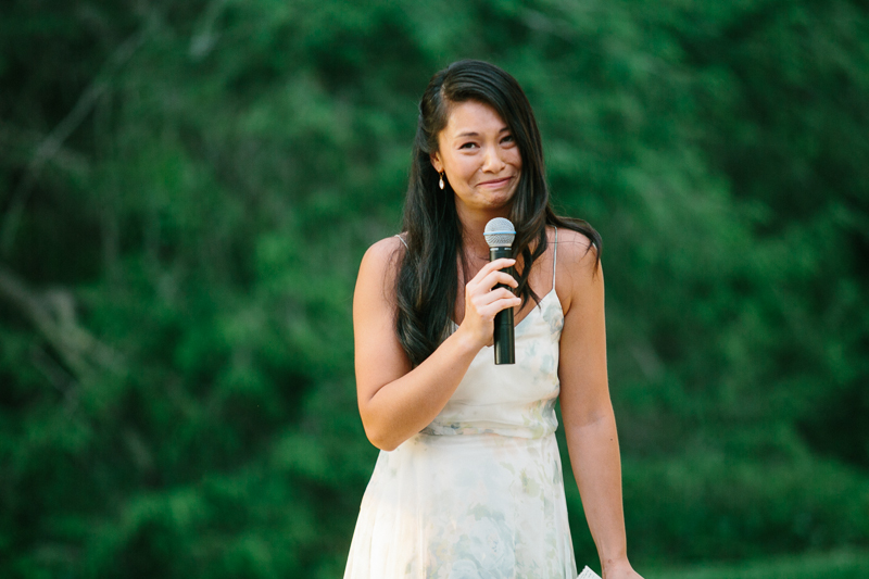Maid of honor makes an emotional toast during this outdoor summer wedding reception.