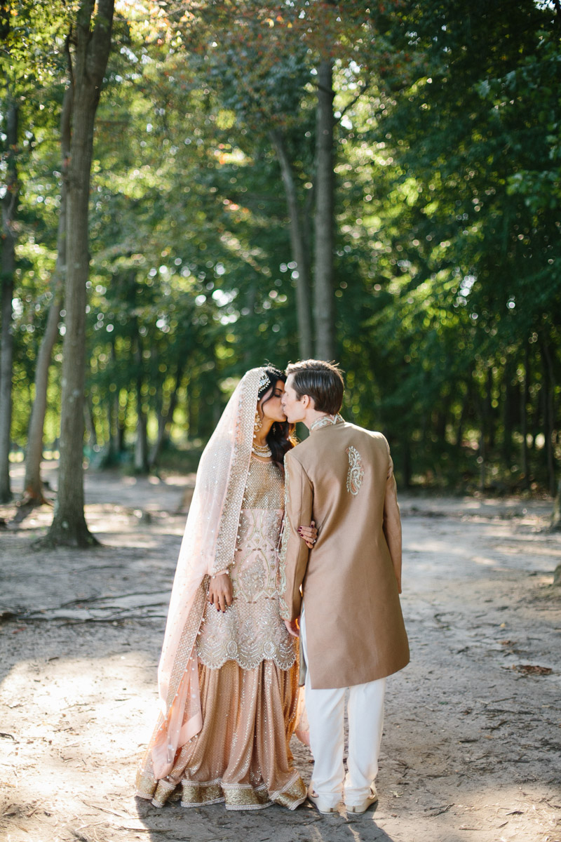 Outdoor fall portraits of the bride and groom after their wedding ceremony.