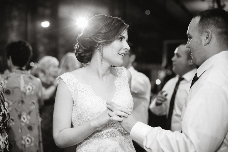 Black and white candids of guests dancing during this creative, modern wedding reception.