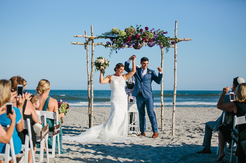 Bride and groom tie the knot on the beach in New Jersey.