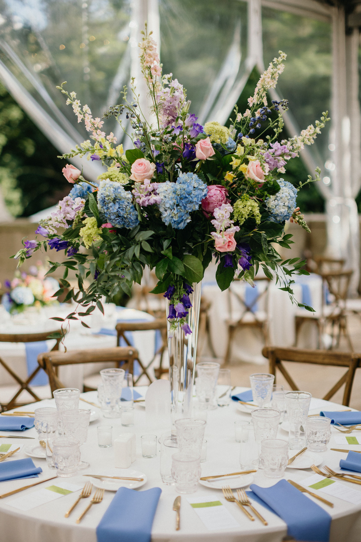 Large wedding centerpiece with pastel florals at a summer Curtis Arboretum wedding.