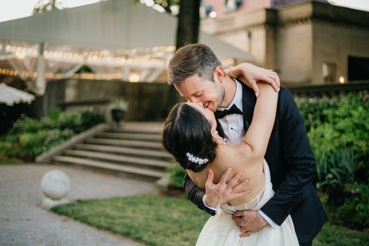 Matt and Alissa dancing outside of the reception space at their Curtis Arboretum wedding.