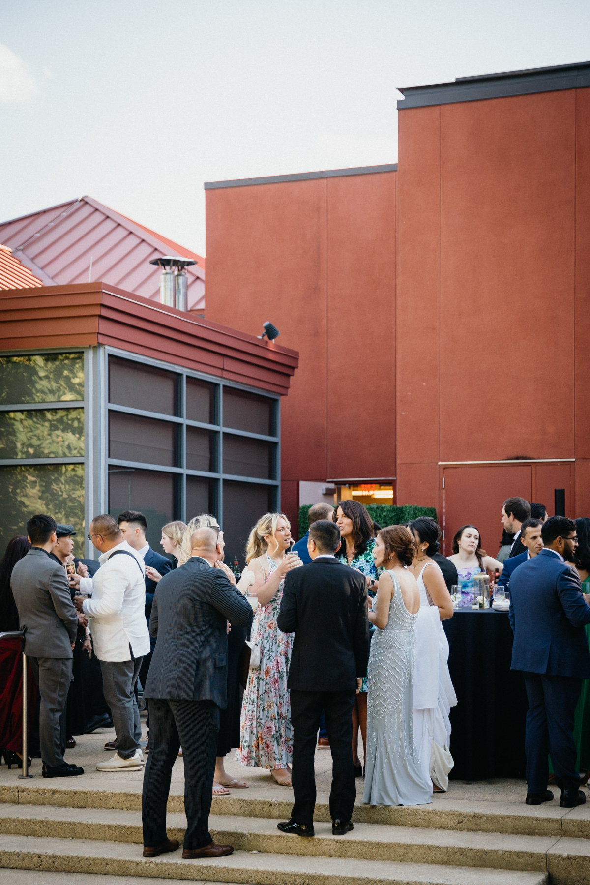 Guests gather during cocktail hour outside of an art museum in Bucks County.