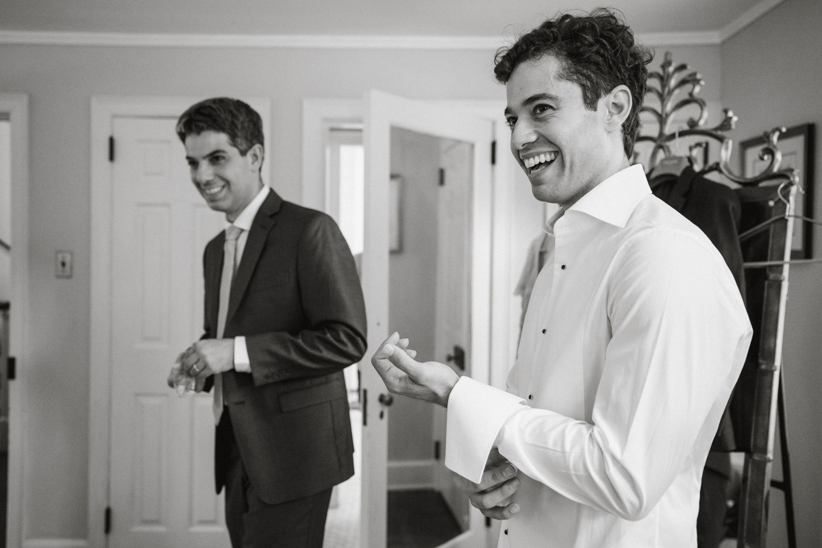 Groom getting ready for his wedding at Philander Chase Knox Estate.