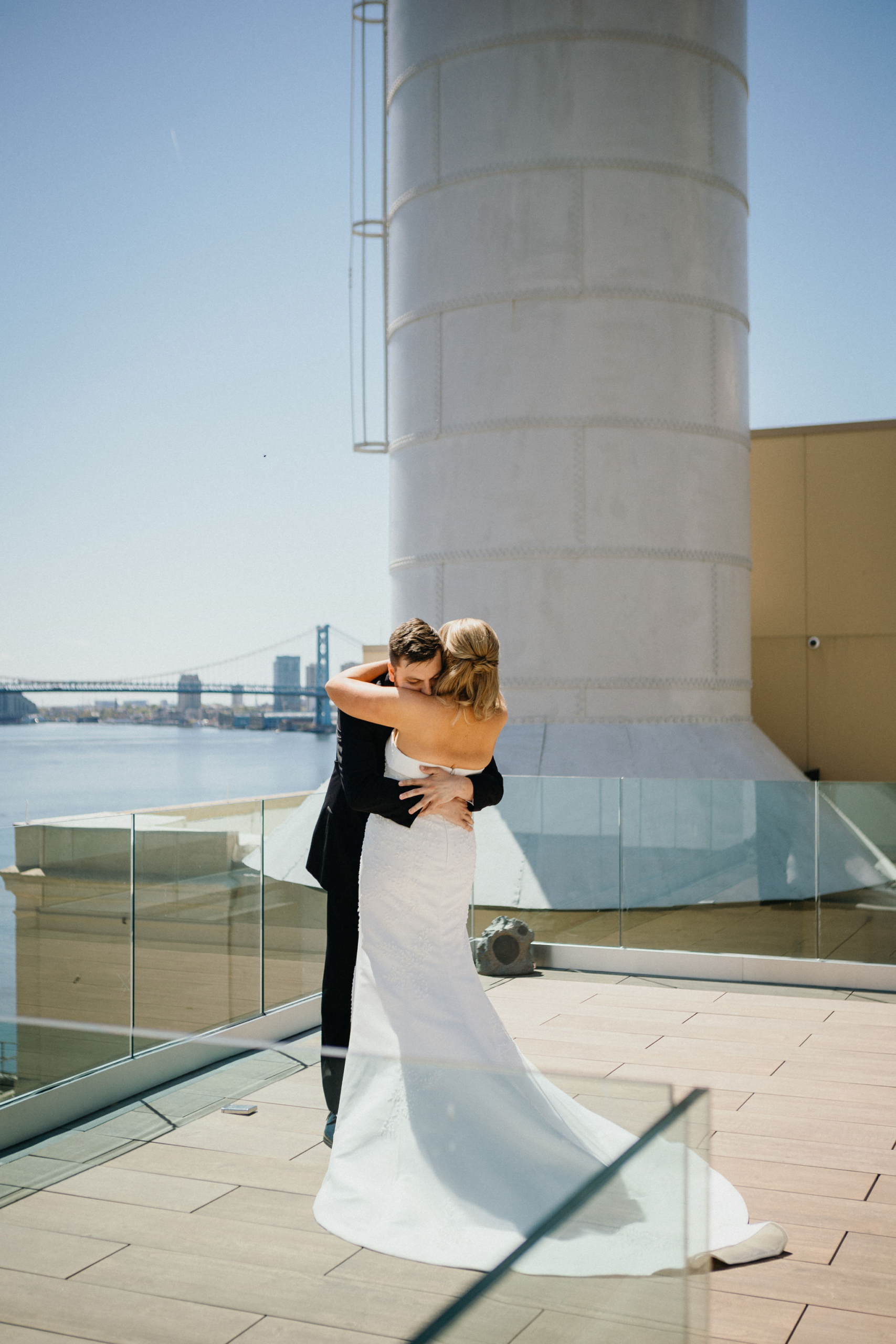 The couple’s first look on a rooftop overlooking the Delaware River.