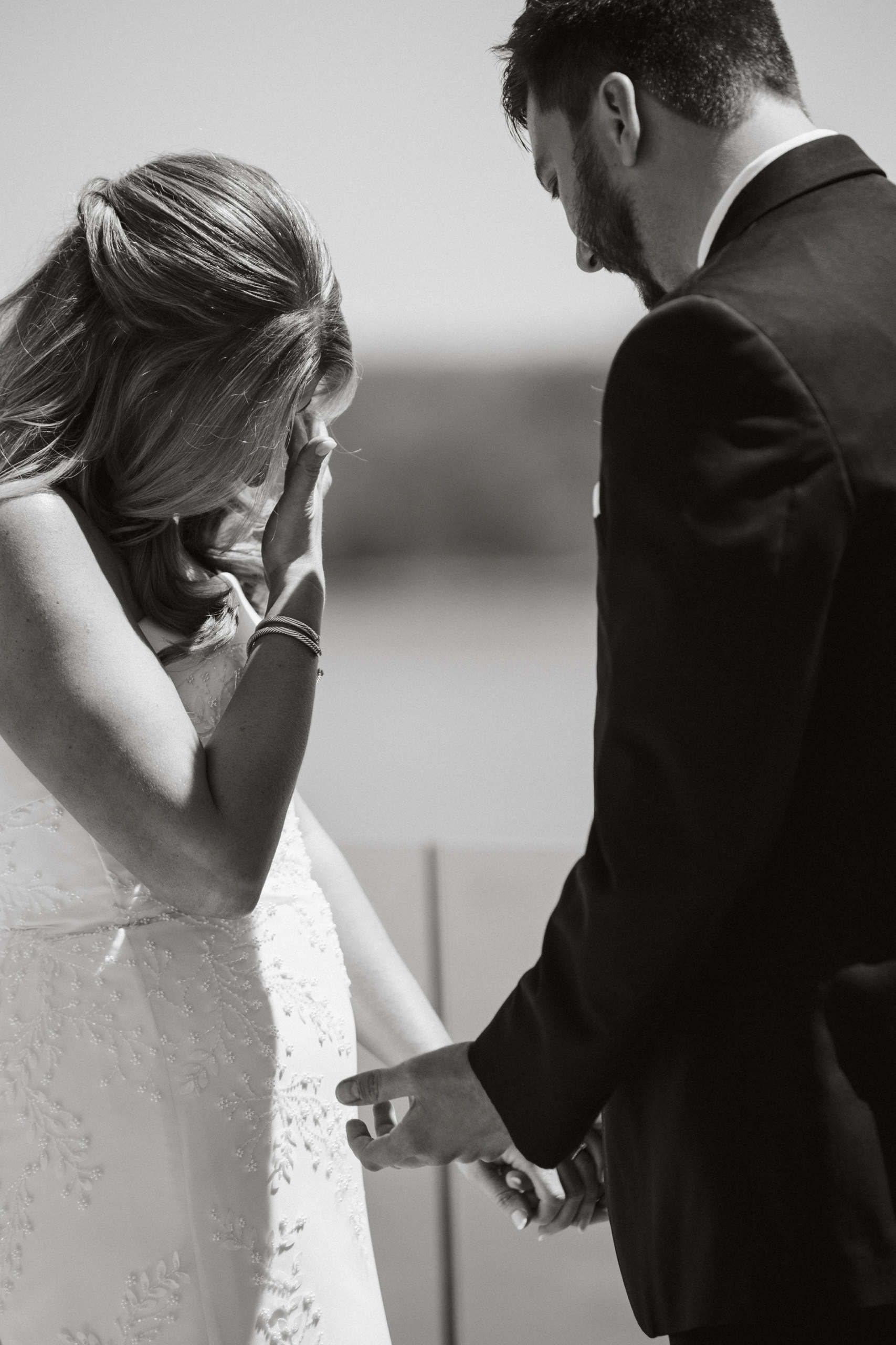 Jake’s emotional reaction during the rooftop first look at the Switch House wedding venue. 