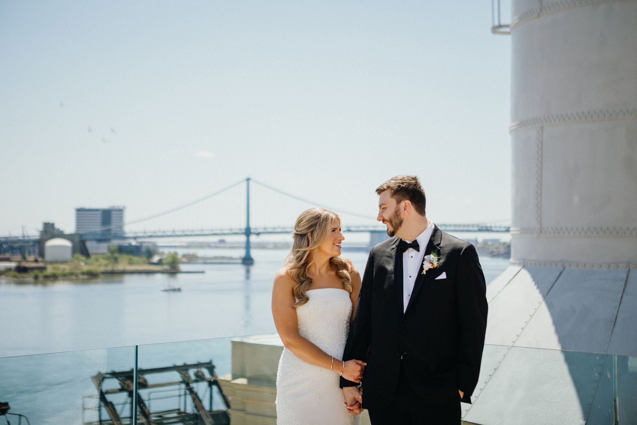 A candid laugh shared between the newlyweds on the rooftop.