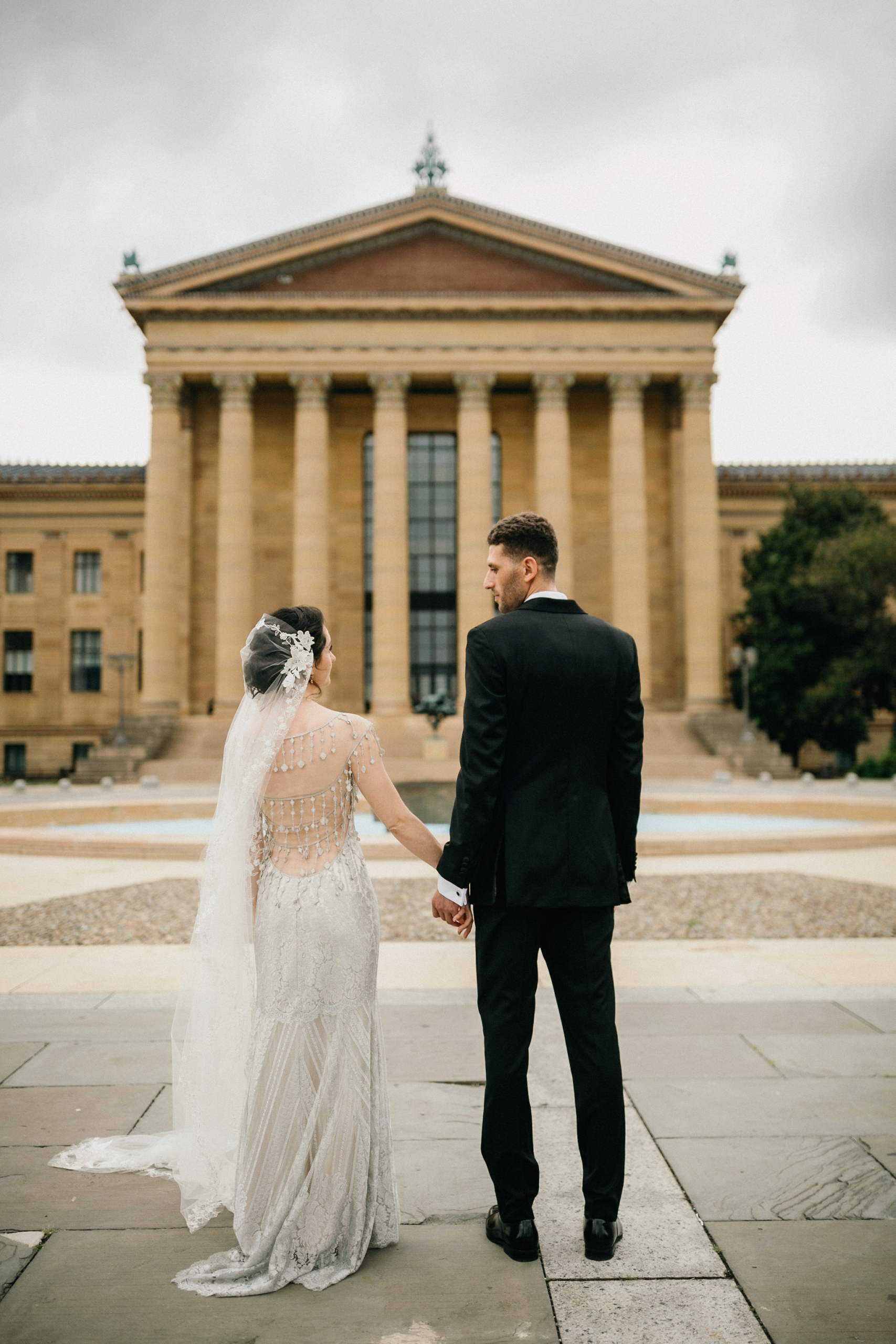 Liz and Bilel did couples portraits around the exterior before their Philadelphia Museum of Art wedding.