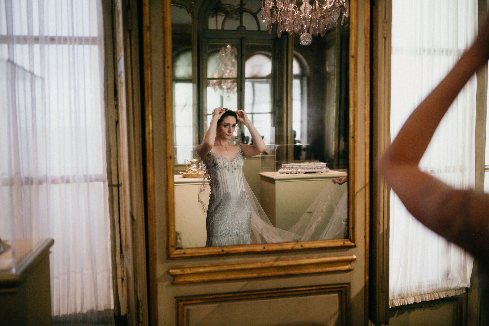 A wedding moment captured at the Philadelphia Museum of Art with artistic details.