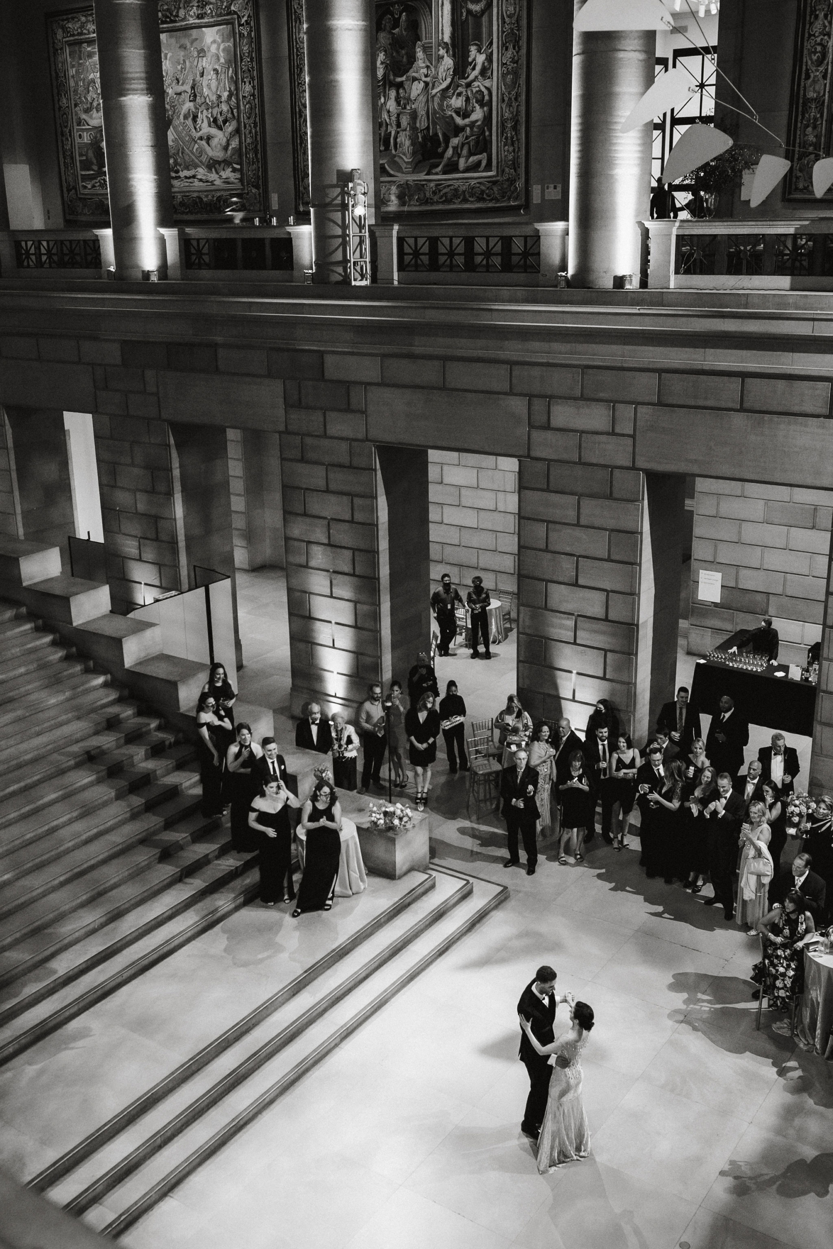 A wedding couple dances in an iconic museum setting in Philadelphia.