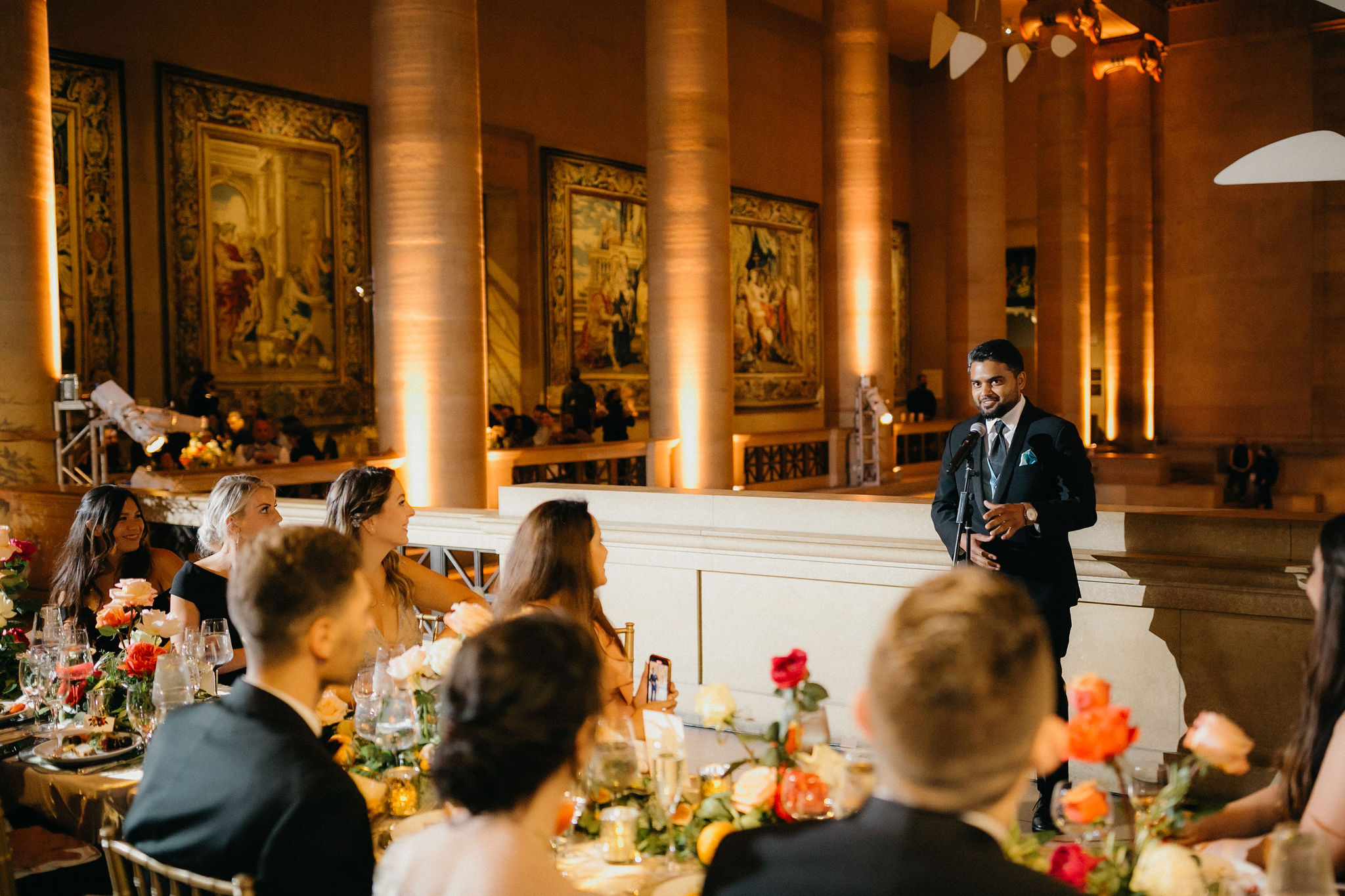 Guests admire the stunning decor at a Philadelphia Art Museum wedding.