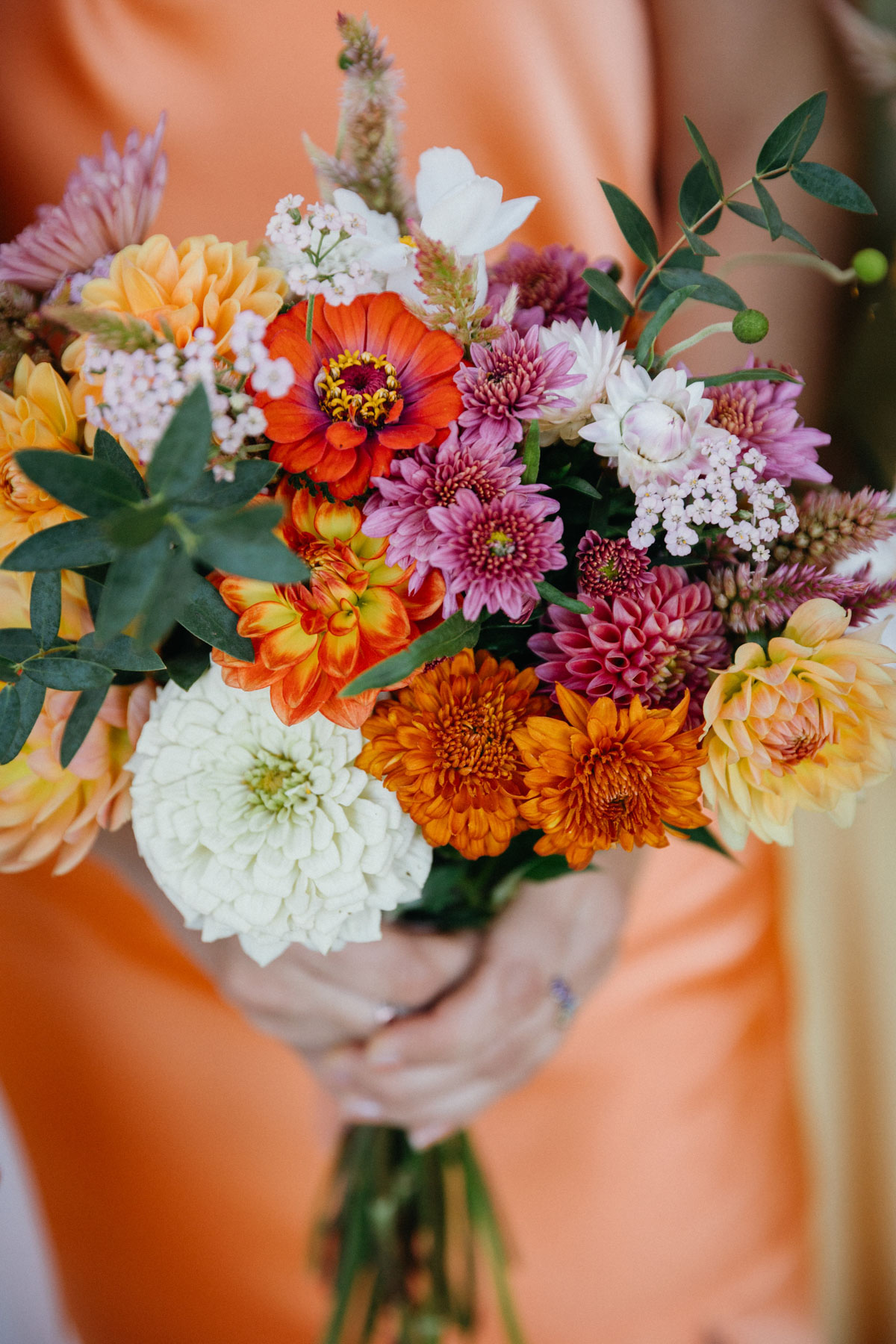 Vibrant bridesmaid bouquet for a Glen Foerd wedding provided by Derby Mill Farm